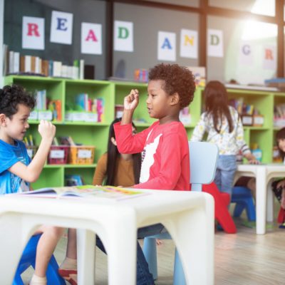 Young Children in colorful classroom