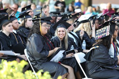 DCCC graduates excited during graduation.