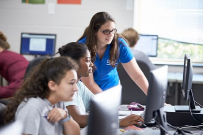 Instructor helping student