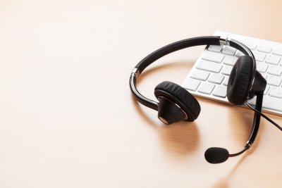 Headphones laying on keyboard