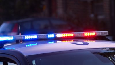 Top of police car with red and blue lights flashing