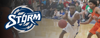 Basketball Player during game with Davidson-Davie Storm Logo overlaid