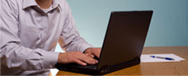 person using laptop computer