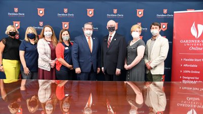 Davidson-Davie’s Dr. Darrin Hartness and Gardner-Webb’s Dr. Ben Leslie are joined by faculty and academic leadership from both schools.