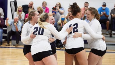 Volleyball Players in Huddle