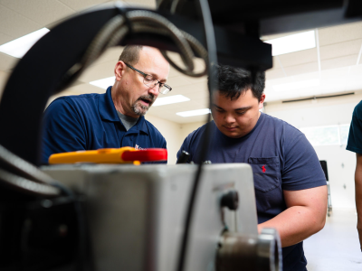 Industrial Systems Technology Student with instructor.