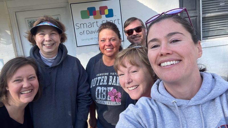 Smart Start of Davie County welcomed a team of volunteers from the college for outside clean-up.