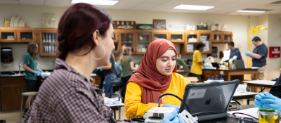 Two students in Biology lab.