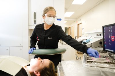 Dental student and patient.