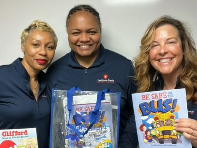 Keisha Jones, Jasmine Hargrave, and Laura Yarbrough who volunteered to create "Transition to Kindergarten" bags at Smart Start of Davison County.