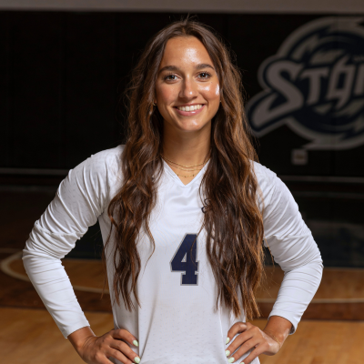 Storm Volleyball Player Wearing Number 4 White Jersey