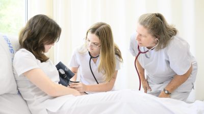 Nursing Assistant Students check vitals