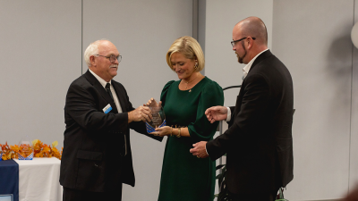 Eric and Megan Anderson of Holly Hill Memorial Cemetery receive award.