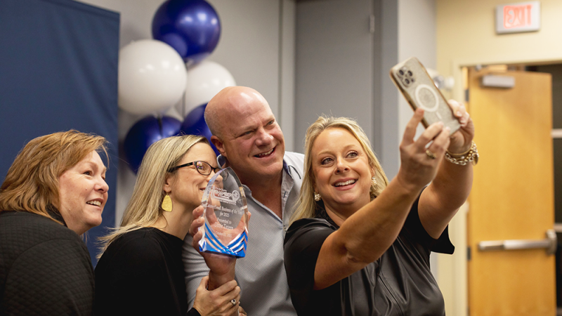 Representatives from Davie Tavern snap a selfie.