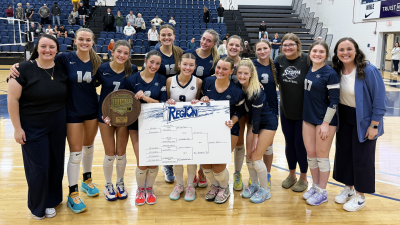 Davidson-Davie women's volleyball team posing after winning the regional championship.