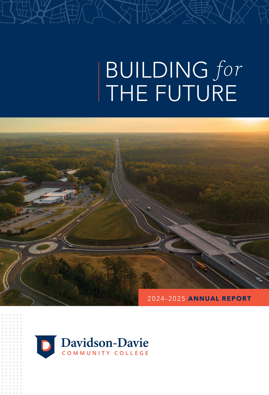 Aerial view of a highway through a forest with an overhead map pattern with text reading, "Davidson-Davie Community College 2024-2025 Annual Report: Building for the Future".