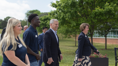 North Carolina Governor Josh Stein walks alongside students and staff at Davidson-Davie Community College.
