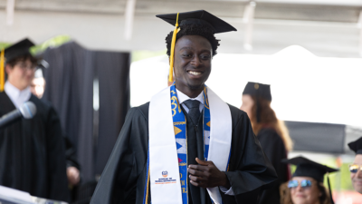 Davidson-Davie Community College student crosses the stage at commencement.