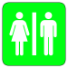 A restroom sign with male and female icons on a bright green background.